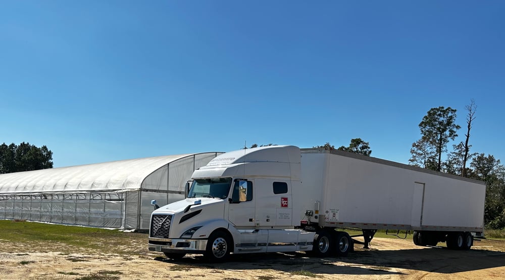 greenhouse and tractor trailer